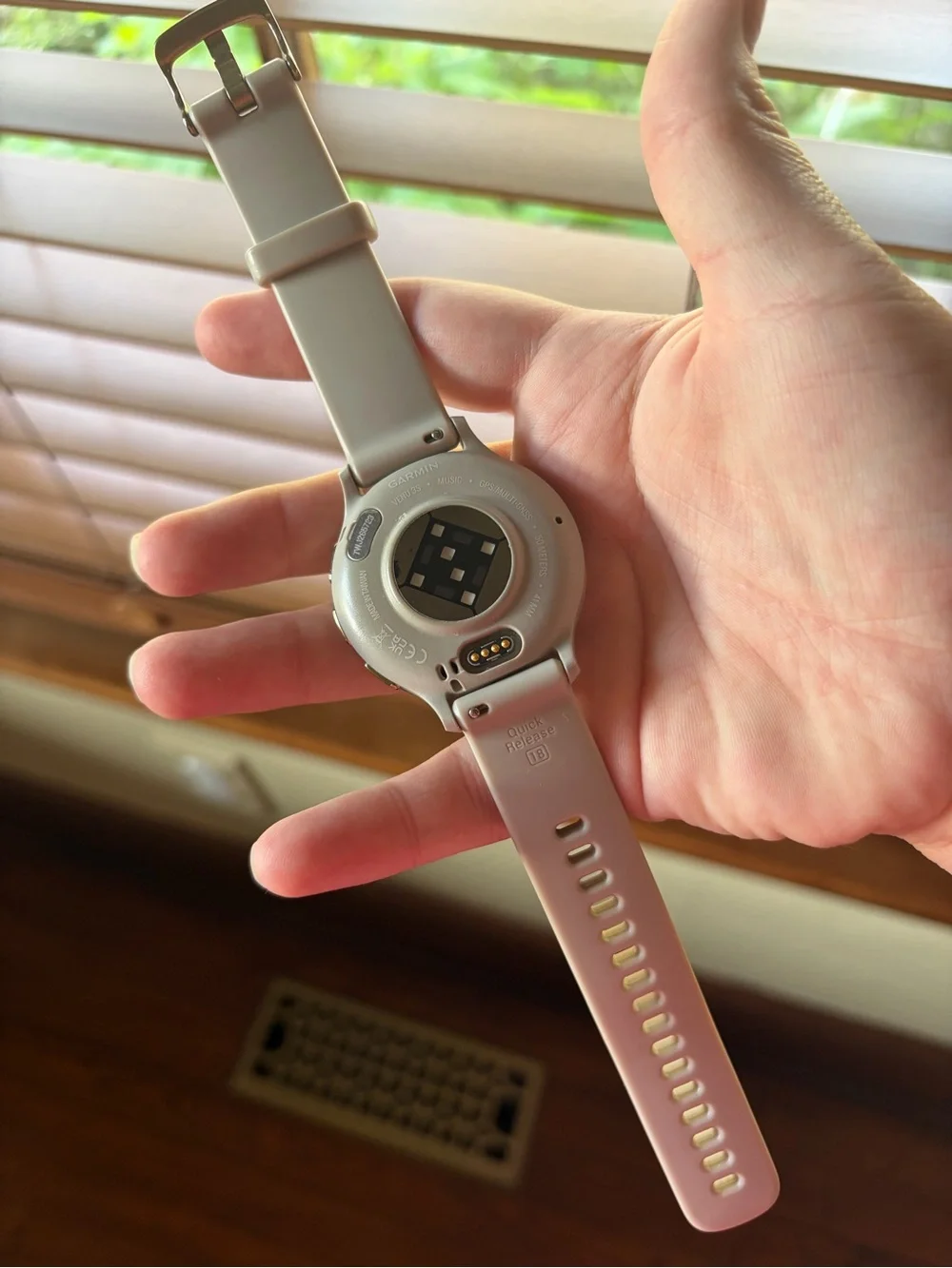 Garmin Venu3 Smartwatch with Light Gray Band and Gold bezel